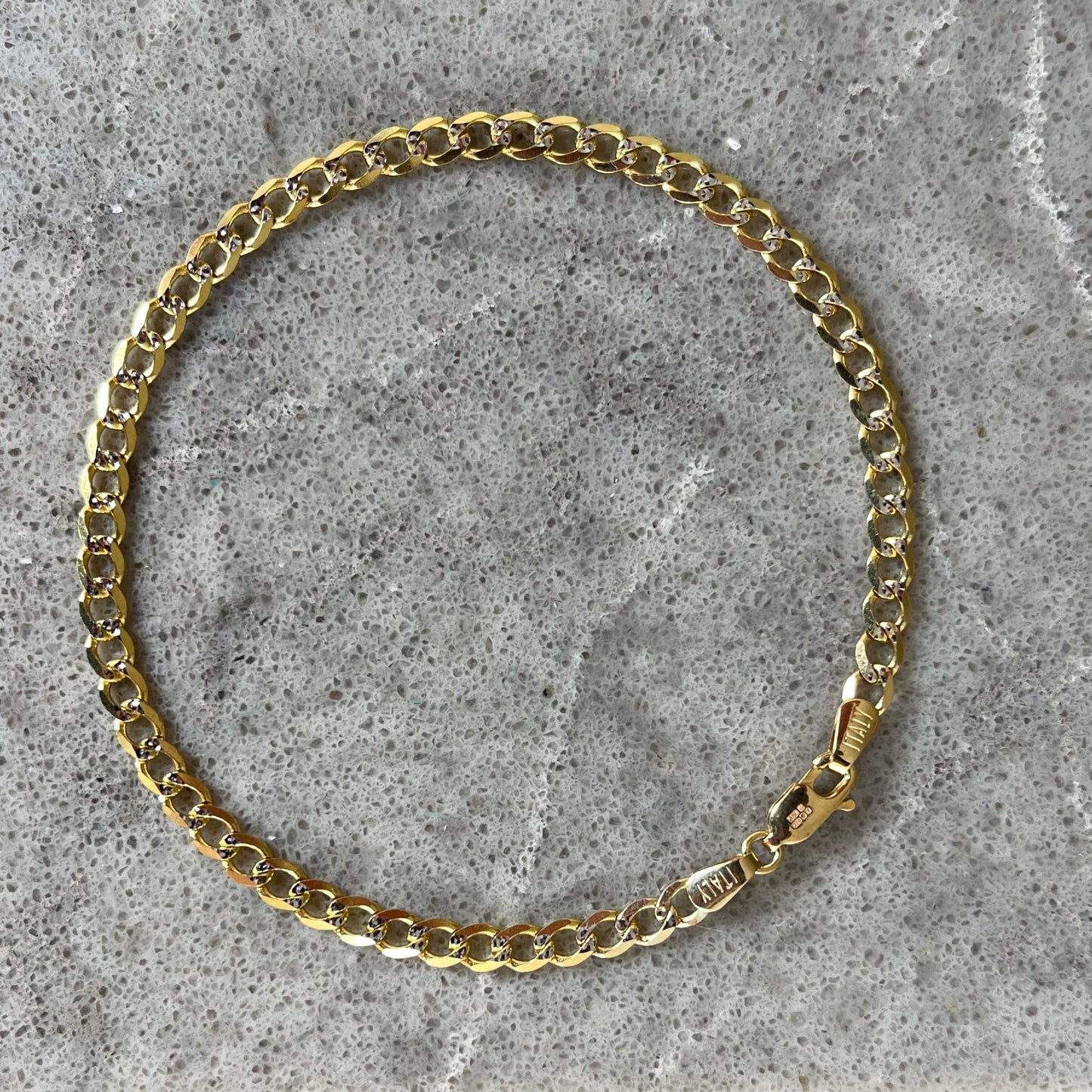 Curb bracelet, 9 ctyellow gold, diamond cut with white gold, 3mm, 8"